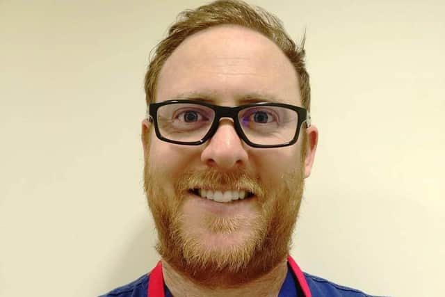 Sterile technician, Lee George, 32, before his head shave.