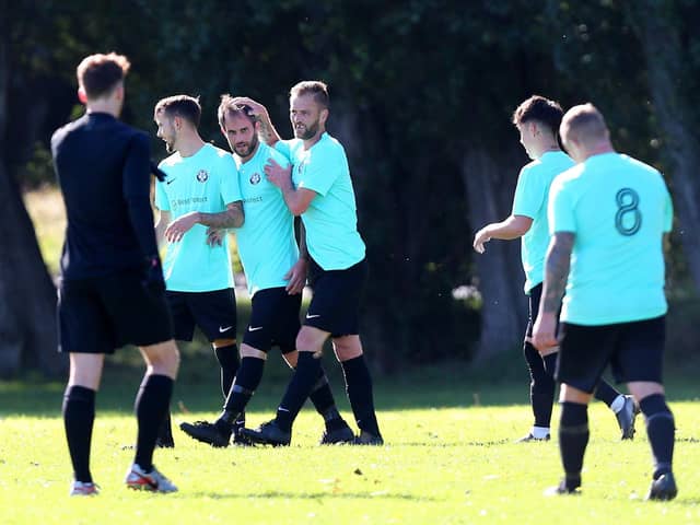 Queens Head celebrate another goal in their 10-3 Hampshire cup win over City of Portsmouth Sunday League side AFC Lakesdie Refit at Cosham's King George Playing Fields. Picture: Chris Moorhouse (jpns 031021-30)