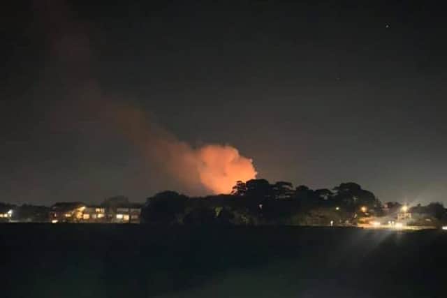 A fire rages from a building near Stokes Bay, Gosport. Picture: Johnny Reilly