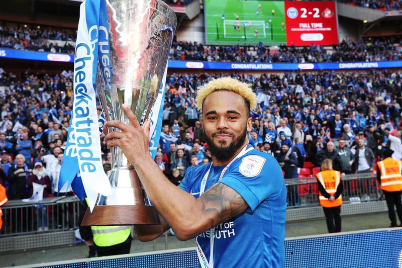 Anton Walkes lifts the Checkatrade Trophy for Pompey. Picture: Joe Pepler