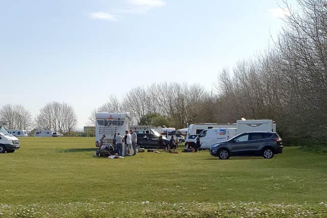 Travellers set up camp on field opposite Port Solent car park on 27 April 2021
