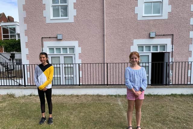 India Shivjee (left), 10, and Arabella West, 10, were happy to be able to see their friends and teachers again.