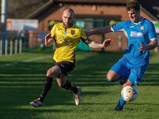 Danny Phillips, left, in action for Infinity against Liphook this season. Picture by Kevin Steele.