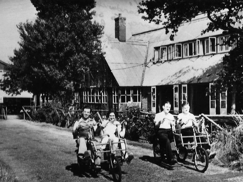 Riding side by side at the Sunshine Holiday Camp, Hayling Island
Memories of sunny holidays on Hayling Island before flying away became popular.  Picture: Mick Cooper postcard collection.