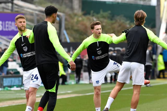 Portsmouth players warming up ahead of the EFL Sky Bet League 1 match between Plymouth Argyle and Portsmouth at Home Park, Plymouth, England on 11 February 2023.