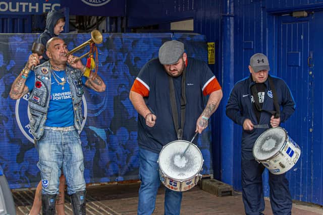 Pompey Vs Oxford.
League one play-off at Fratton Park on 3 July 2020.

Pictured:  John Westwood, William Kipling and Andy Johnston celebrating after the game.

Picture: Habibur Rahman