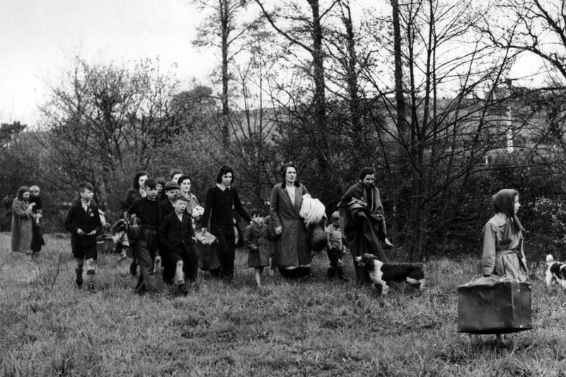 circa 1940:  Citizens of Portsmouth trying to find sleeping accommodation in the nearby countryside, after severe bombing raids on their city.  (Photo by Keystone/Getty Images)