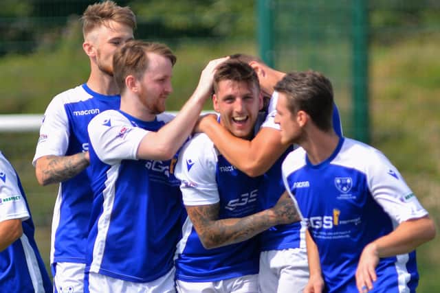 Ryan Chandler is all smiles after scoring for Denmead in their 6-1 HPL victory over Winchester Castle. Picture: Martyn White.