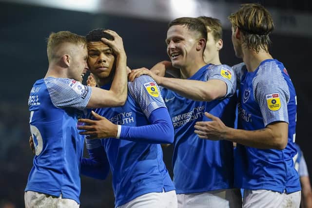 Dane Scarlett is mobbed by his team-mates following his last-gasp winner over Burton. Picture: Jason Brown/ProSportsImages