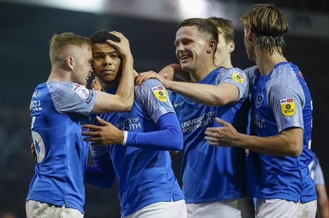 Dane Scarlett is mobbed by his team-mates following his last-gasp winner over Burton. Picture: Jason Brown/ProSportsImages