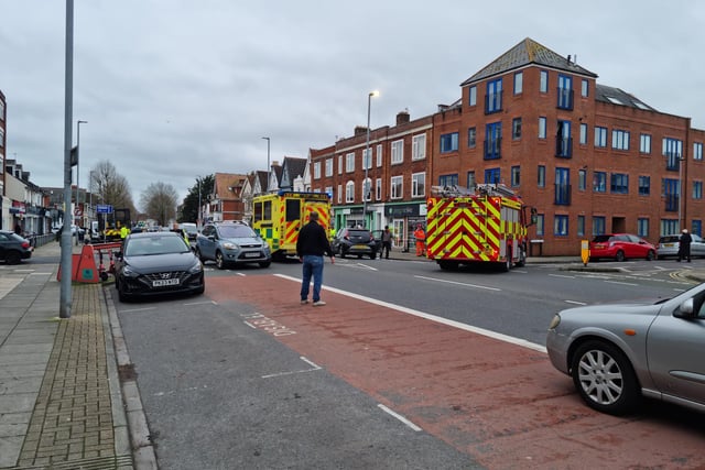 London Road crash scene in Portsmouth that left woman seriously injured