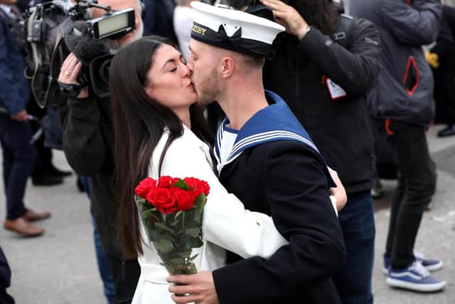 Homecomgin for HMS Brocklesby - first homecoming with families on the dock for almost two years at the base.

Pictured is Hayley Cranfield getting roses from her boyfriend Orren Stainton.
Picture: Sam Stephenson