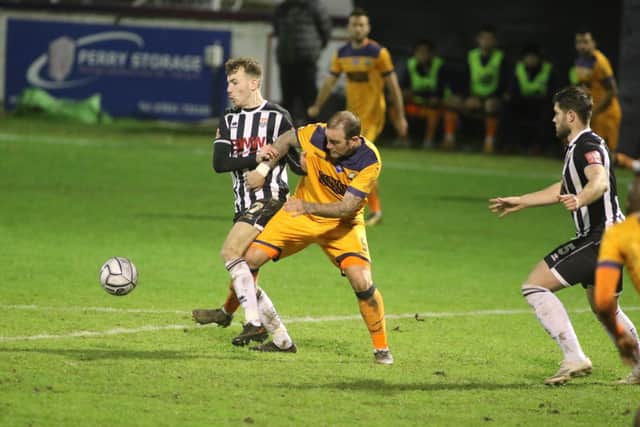Danny Kedwell battles for possession during Hawks' National League South loss at Bath on Tuesday. Pic: Kieron Louloudis.