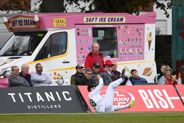 Hampshire's Brad Wheal fails to stop a boundary. Photo by Gareth Copley/Getty Images.
