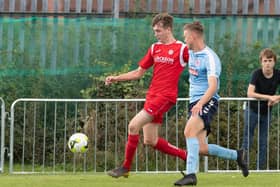 Harry Jackson, left, was on the scoresheet as Horndean became the first club this season to take Wessex League points off Premier Division table-toppers AFC Portchester. Picture: Keith Woodland