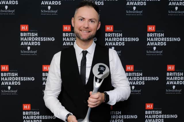Andrew Smith has been shortlisted for Southern Hairdresser of the Year two years running and last year he came home a winner. 
Pictured: Andrew Smith receiving his trophy for Southern Hairdresser of the Year 2022.
Alison Jameson Consulting