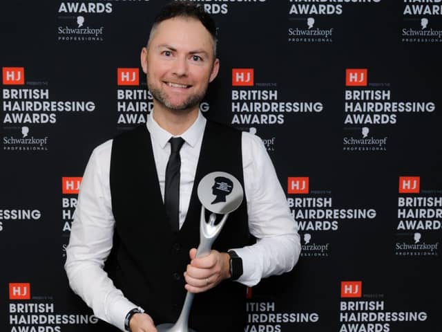 Andrew Smith has been shortlisted for Southern Hairdresser of the Year two years running and last year he came home a winner. 
Pictured: Andrew Smith receiving his trophy for Southern Hairdresser of the Year 2022.
Alison Jameson Consulting