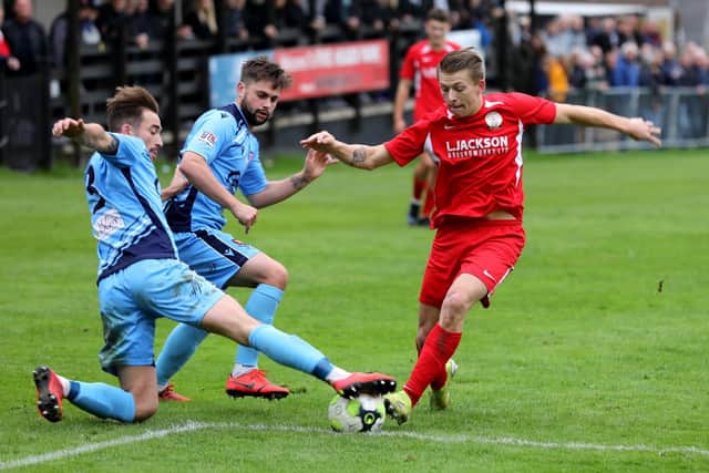 Horndean's Zack Willett, right, hit a hat-trick last January when Horndean won 3-1 at AFC Stoneham. Picture: Sam Stephenson