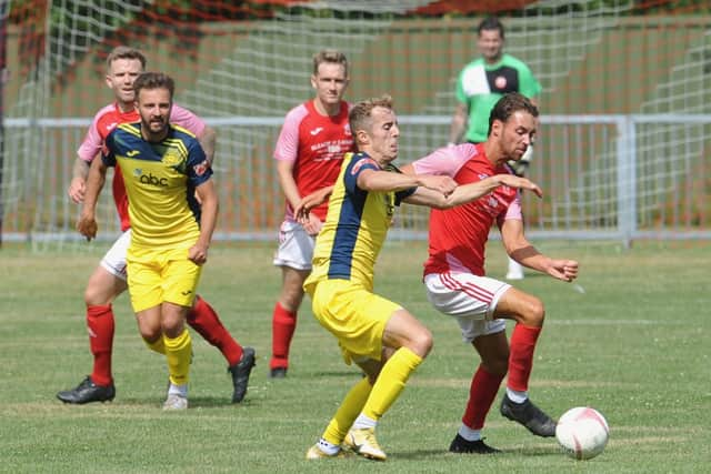 James Franklyn challenges for possession during the 8-0 friendly win at Arundel. Picture by Steven Goodger.