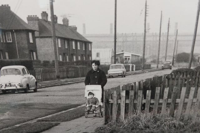 Walking through the village in 1968.