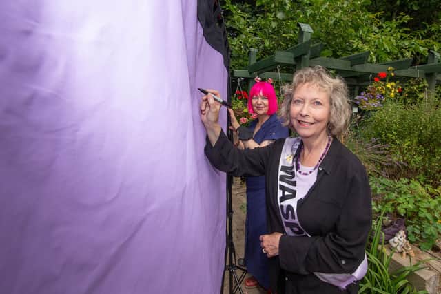 Artist Mandy Webb and Shelagh Simmons signing the new banner at Baffins Pond Association
Picture: Habibur Rahman