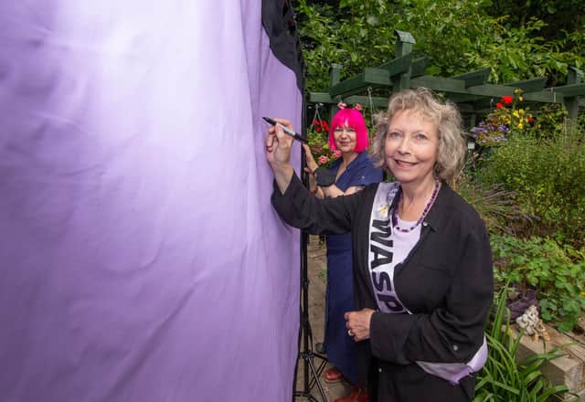 Artist Mandy Webb and Shelagh Simmons signing the new banner at Baffins Pond Association
Picture: Habibur Rahman