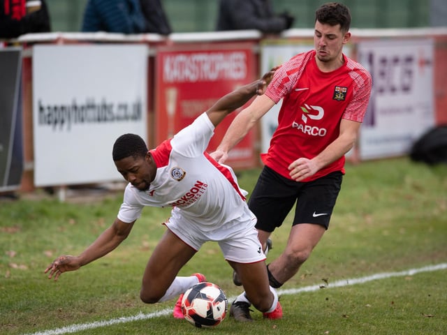 Fuzz Kanjanda is brought down by Charlie Cooper. Picture: Keith Woodland