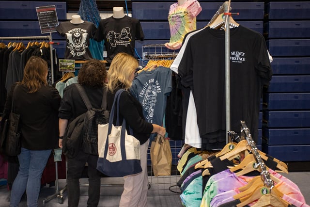 Shoppers exploring the clothing stalls

Photos by Alex Shute