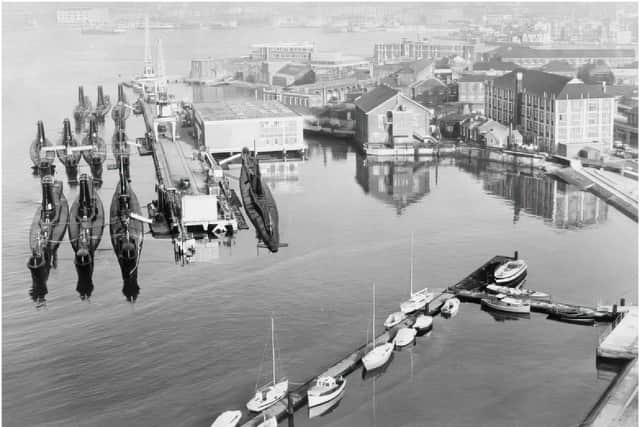Submarine docks at HMS Dolphin in Gosport. 

Credit: Imperial War Museum