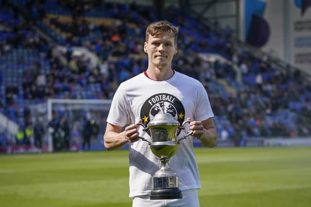 Sean Raggett is ready to hand over his The News/Sports Mail Player of the Season trophy - and he knows who deserves it the most. Picture: Jason Brown/ProSportsImages
