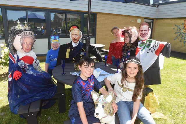 Gomer Junior School in Alverstoke, celebrated The Queen's Platinum Jubilee on Friday, May 27 and made Royal family scarecrows.

Pictured is: (back Oliver Caisley (11) and Willow Toastivine (11) with (front) Jacob Willis (9) and Mia Walls (10).

Picture: Sarah Standing (270522-8442)