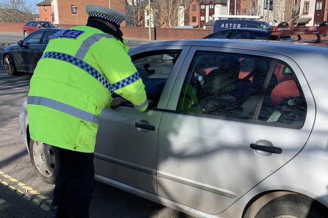 Police on a mobile phone operation in Fareham on March 16 2020. Several drivers were handed fixed penalty notices of £200 with six points on their licences. Picture: Ben Fishwick