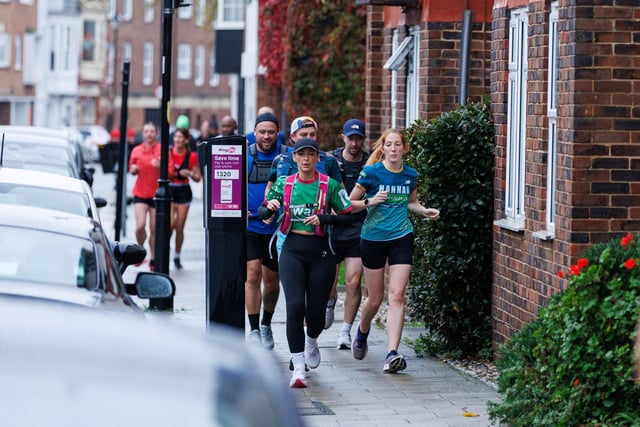 Runners hit the streets in wet and windy conditions despite The Great South Run being cancelled.