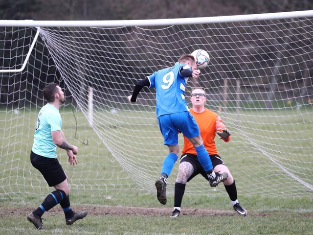 Barry Jeans about to head in AC Copnor's second goal. Picture: Stuart Martin