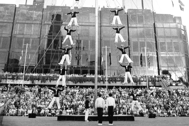 The Royal Naval Display team climb the mast in the Beat the Retreat ceremony in the Guildhall Square, 1985. The News PP4949