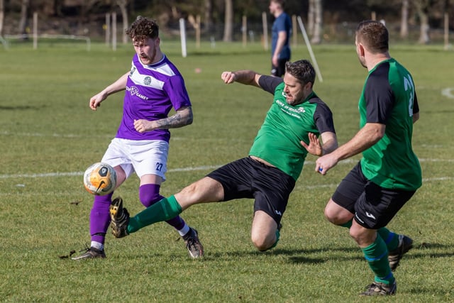 AFC Hilsea (purple) v Saturn Royale. Picture: Mike Cooter