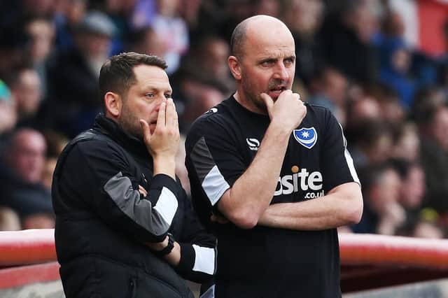 Former Pompey boss Paul Cook, right, and Leam Richardson were in opposite dugouts for Ipswich's draw with Wigan. Picture: Joe Pepler