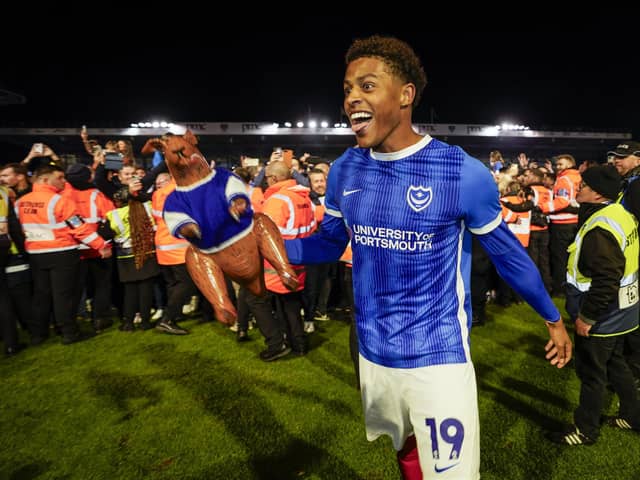 Kusini Yengi celebrates Pompey’s promotion against Barnsley in April 2024. Picture: Jason Brown