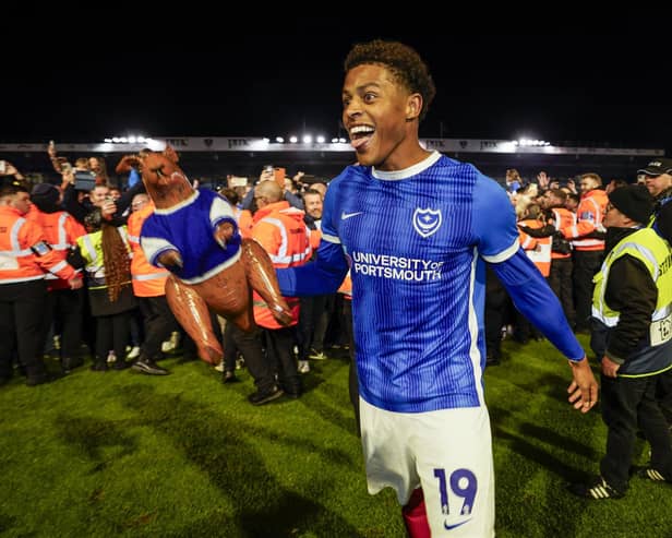 Kusini Yengi celebrates Pompey’s promotion against Barnsley in April 2024. Picture: Jason Brown