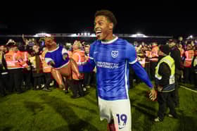 Kusini Yengi celebrates Pompey’s promotion against Barnsley in April 2024. Picture: Jason Brown