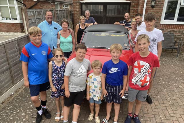 Chris and Caroline with their children and grandchildren