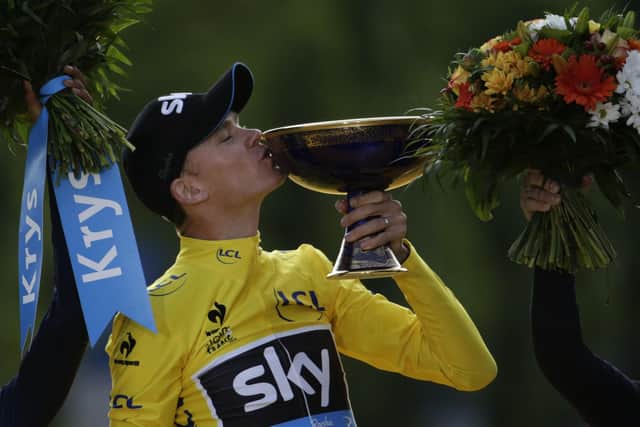 Chris Froome wins the Tour de France in 2015  - one of many cycling successes overseen by Sir Dave Brailsford. Picture: KENZO TRIBOUILLARD/AFP via Getty Images.
