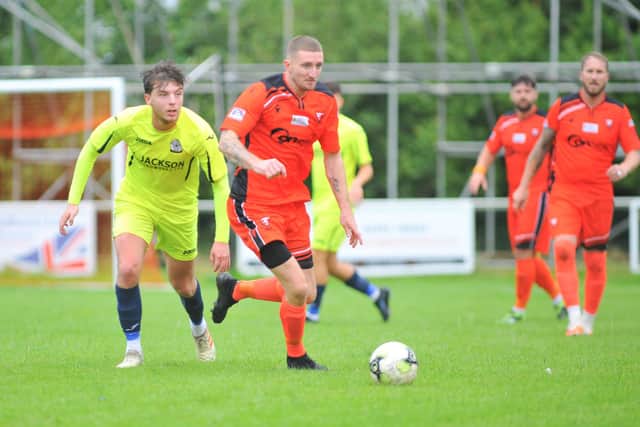 Portchester striker Lee Wort (orange, second left). Picture: Martyn White