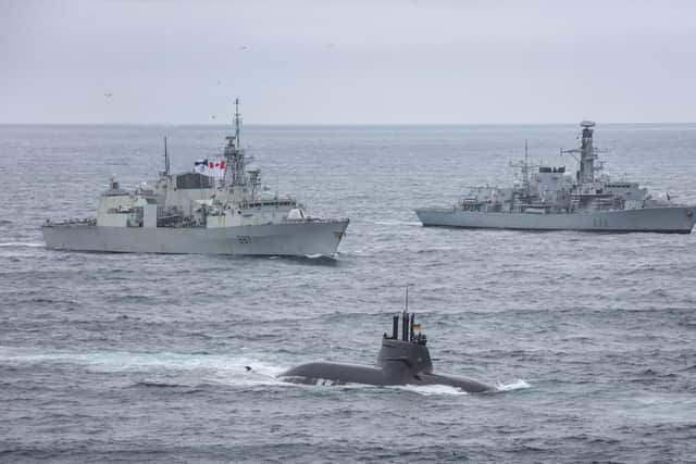 HMS Kent, pictured back right, sails with another Nato warship and submarine. Photo: Royal Navy