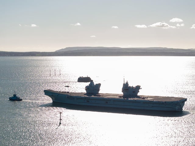 HMS Prince of Wales sailing out of Portsmouth as she heads for a huge Nato deployment in the North Sea. Picture: Michael Woods - Solent Sky Services.