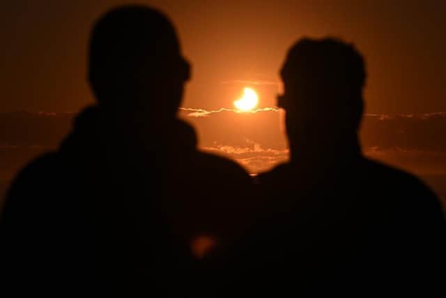 Eclipse glasses must be worn when looking directly at the eclipse 