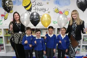 Executive Headteacher Sara Paine (left) and Head of School Rachel Thripp (right) celebrate with pupils.