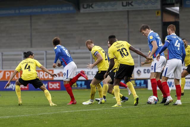 Marcus Harness of Portsmouth (2nd left) scores their second goal with a backheel to equalise and make the score 2-2 during the Sky Bet League One match between Burton Albion and Portsmouth at Pirelli Stadium on October 3rd 2020 in Burton, England. (Photo by Daniel Chesterton/phcimages.com)