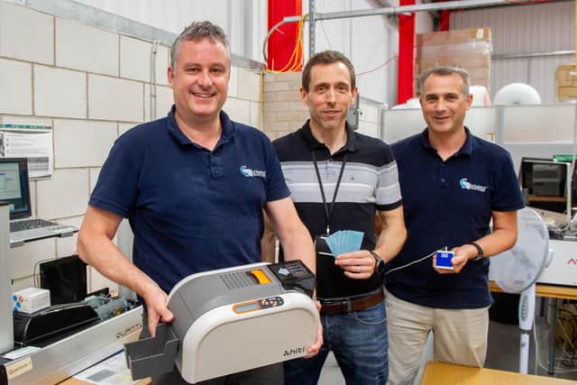From left, joint directors, Chris Allen, Michael Smith and director of the Hilsea warehouse, Kevin Loveman. Picture: Habibur Rahman