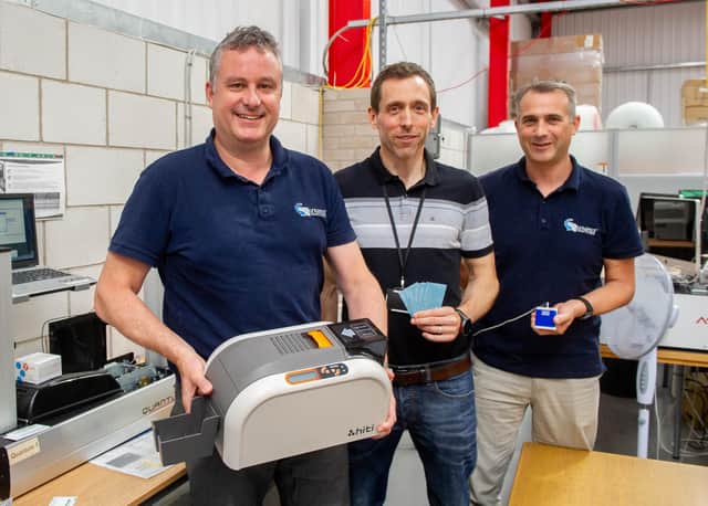 From left, joint directors, Chris Allen, Michael Smith and director of the Hilsea warehouse, Kevin Loveman. Picture: Habibur Rahman